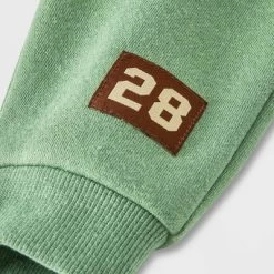 Baby Boys' Disney Mickey Mouse Solid Top And Bottom Set - Green/Tan -Family Style Shop GUEST a01bbe9a 83d1 4c7e 8095 8f05a8d6bc55